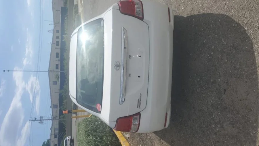 Newly imported white Toyota Axio For Sale In Jamaica, Westmoreland
